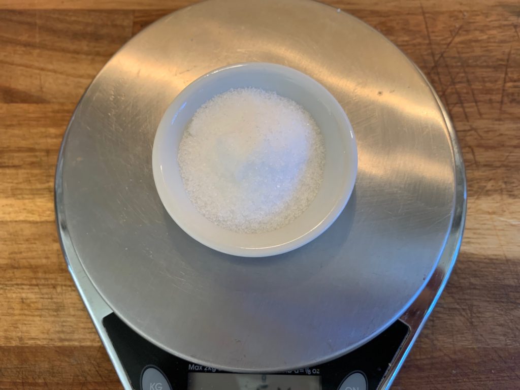 weighing the salt for sauerkraut