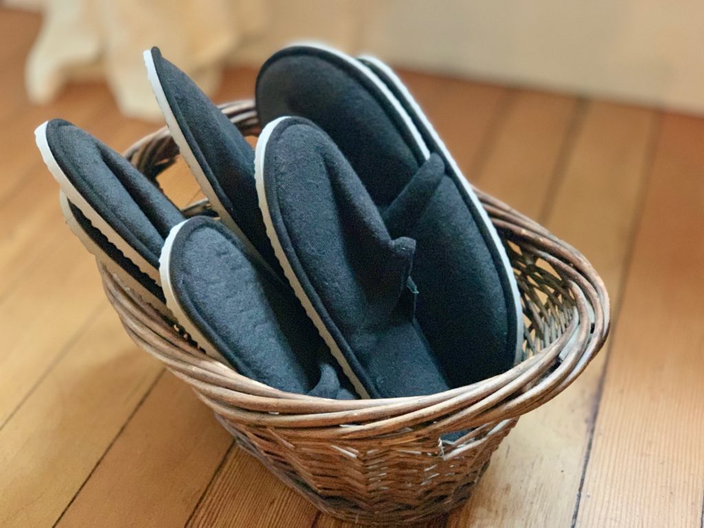 basket with house slippers