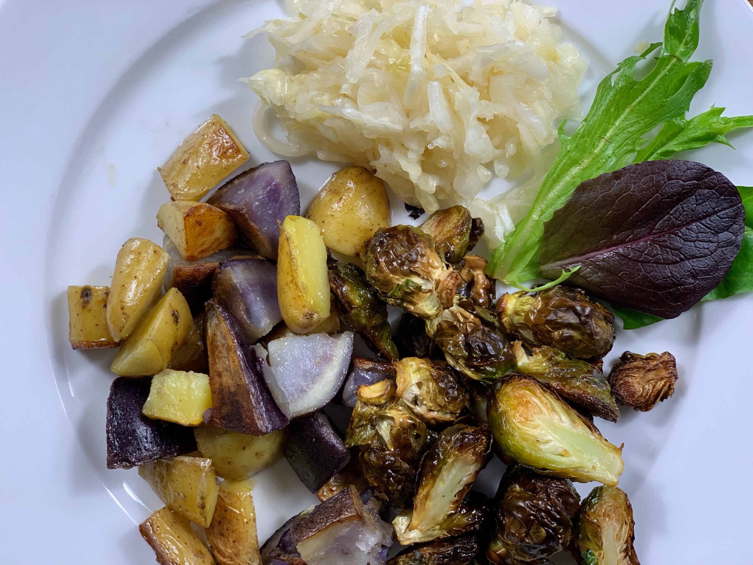 camel hump fat roasted brussel sprouts and fried potatoes
