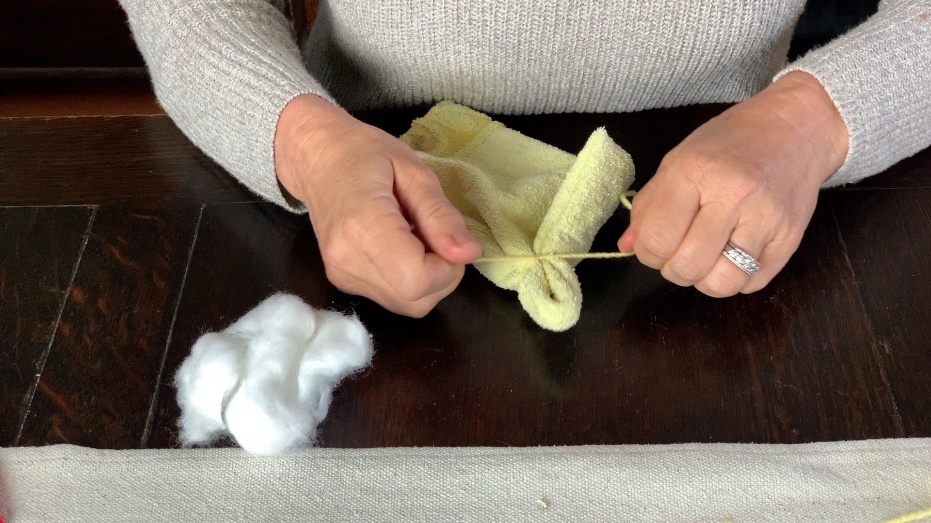 shaping the ear of the washcloth bunny