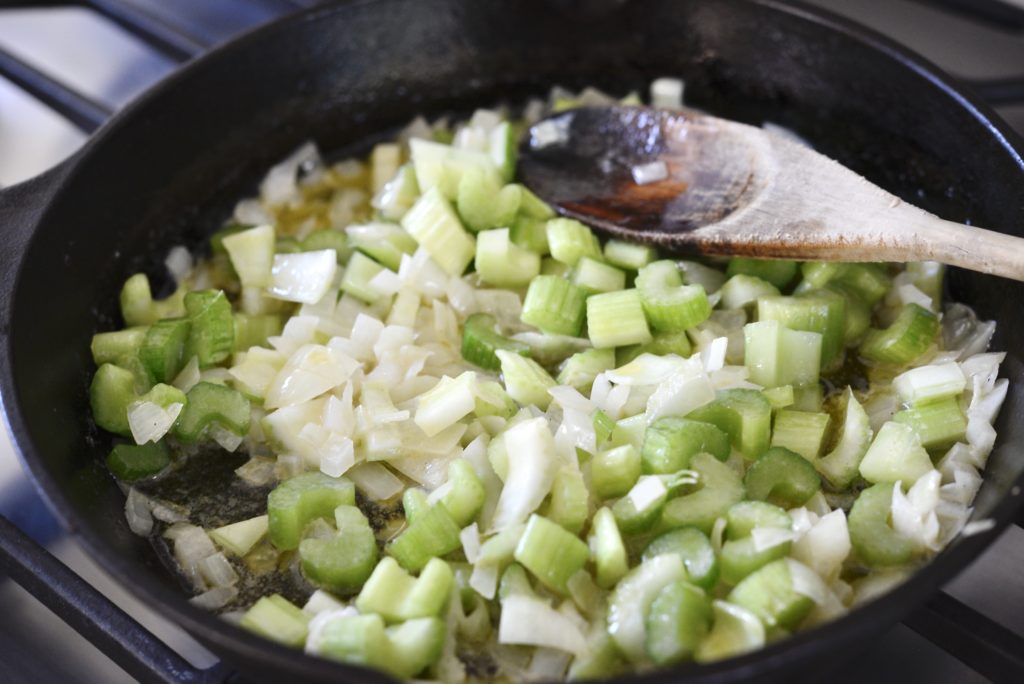 sauteeing onions and celery in cast iron skillet