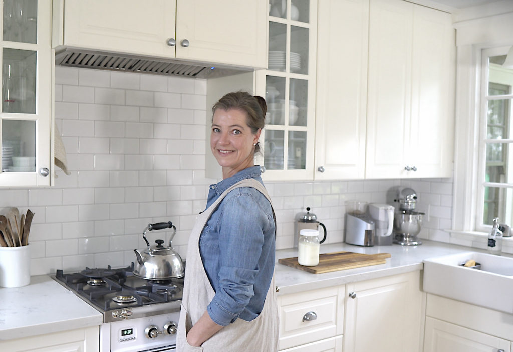 Anja in our urban homestead kitchen