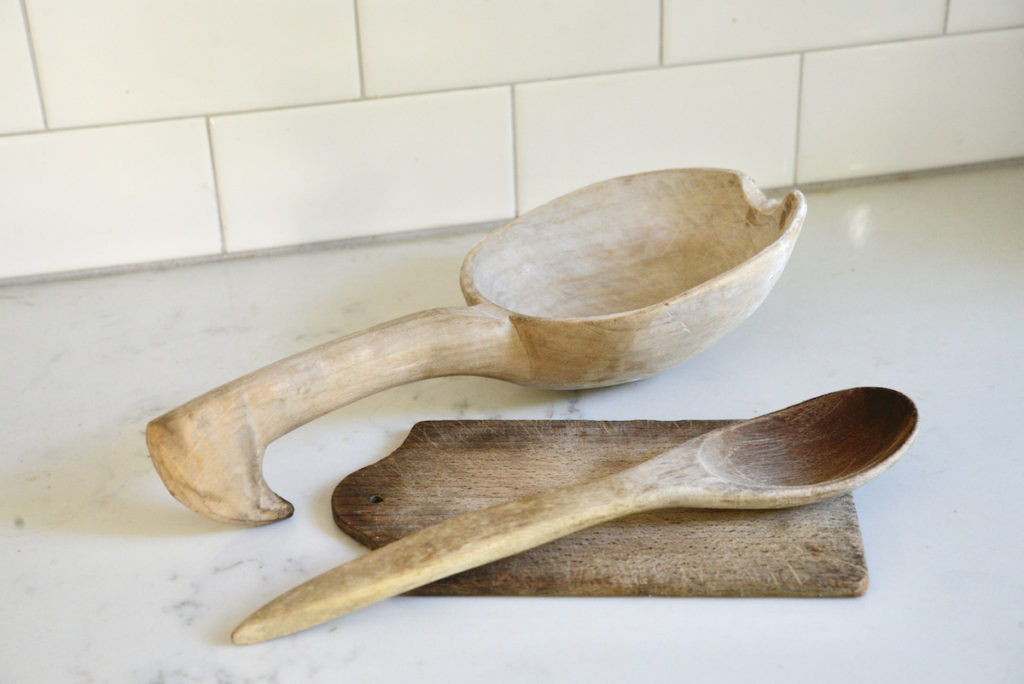 antique wooden cutting board and spoons