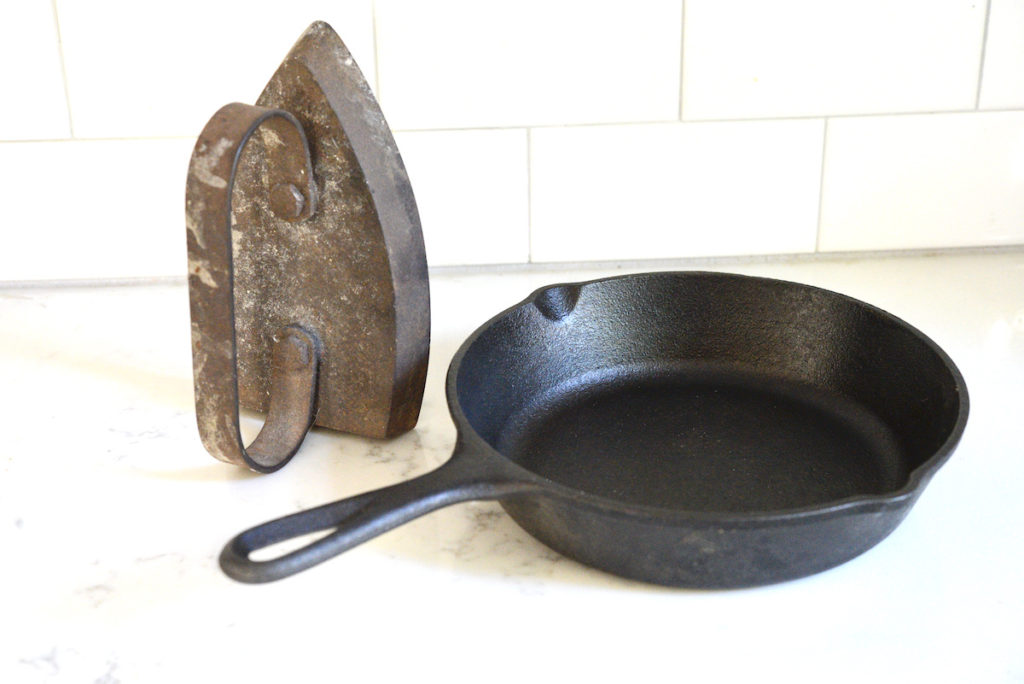 antique hot iron and cast iron skillet